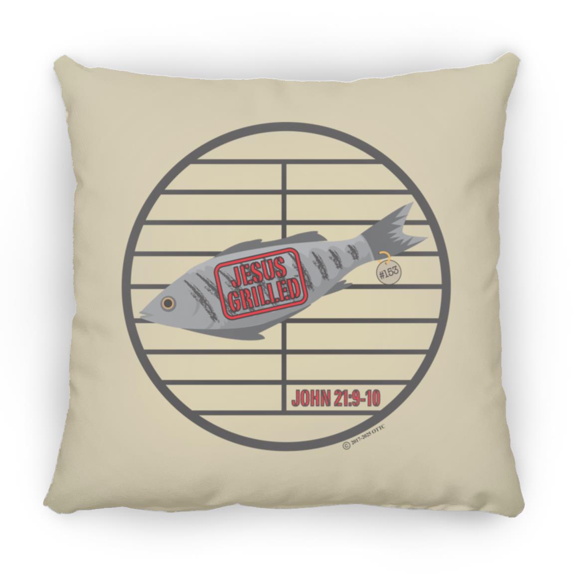 Large square pillow, tan cover with fish and “Jesus Grilled” graphic